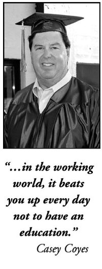 A male student in a cap and gown with his testimonial. "... in the working world, it beats you up every day not to have an education." Casey Coyes